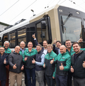 Gruppenbild mit Stadler Zug